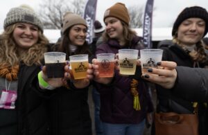 group of people at a winter beer festival in st. joseph michigan